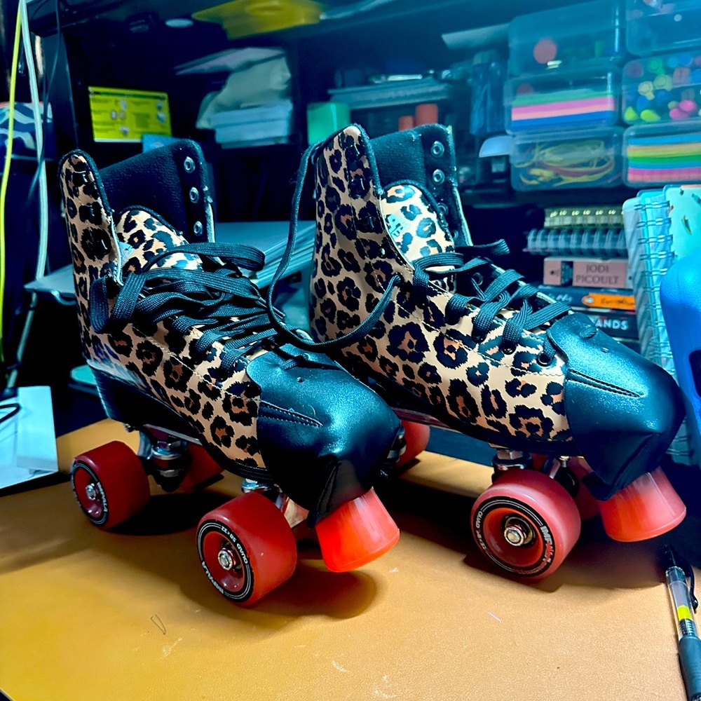 Impala cheetah print roller skates